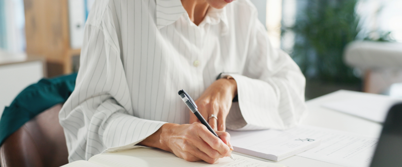 A female professional reviewing documents