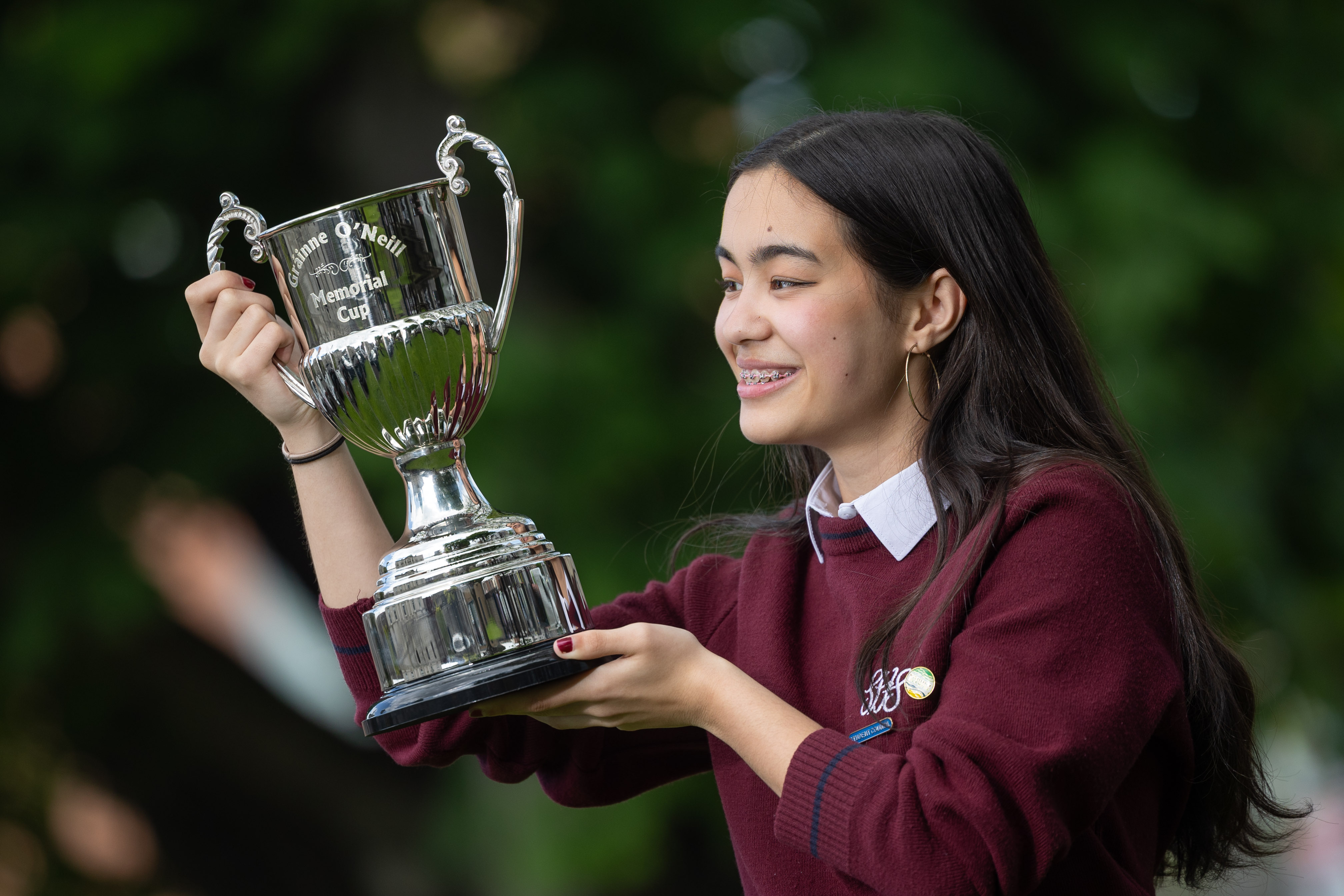 Rhea Schreiber from Sacred Heart Secondary School, Tullamore holds the grand prize trophy cup